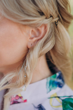 beautiful earring in girl's ear