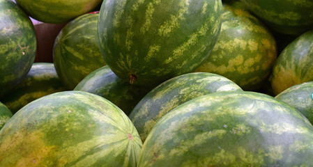 watermelons on display at market
