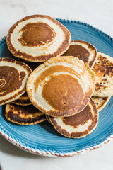 Stack of Plain Pancakes in Plate.