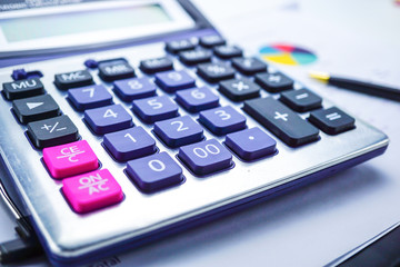 Obraz premium Calculator on chart and graph spreadsheet paper. Finance development, Banking Account, Statistics, Investment Analytic research data economy, Stock exchange trading, Business company concept.