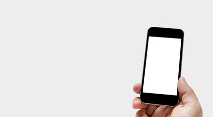 Isolated mobile phone in a hand with white screen for message