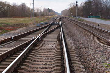 Fototapeta na wymiar Railroad tracks. Branches of rails. Railway station. Different directions of railroad tracks.