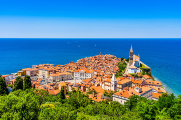 Iconic aerial view of harbor fishing town of Piran, Slovenia on the Adriatic Sea riviera in the...