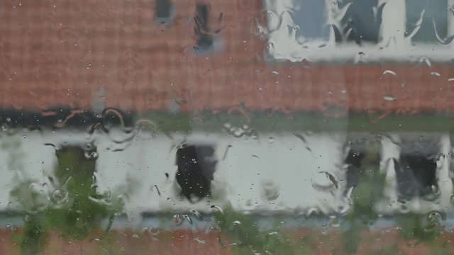 Heavy rain on a house window