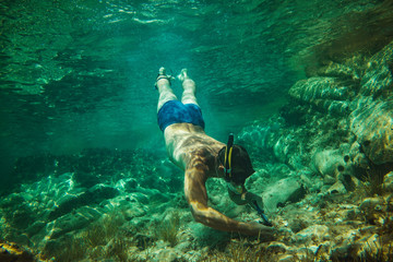 Naklejka na ściany i meble Exploring Under The Water