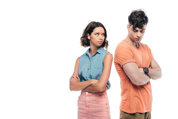 offended young couple standing with crossed arms isolated on white