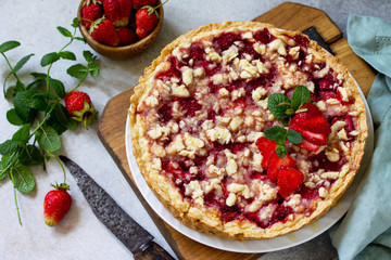Delicious summer dessert strawberry pie with crumble, sweet delicious holiday cake with strawberry...