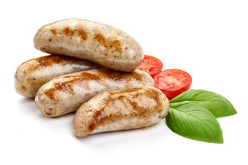 Grilled Munich Veal Sausages, close-up, isolated on white background