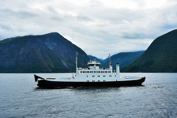 Amazing blue landscape and ferry transportation on Dalsfjord in Norway.