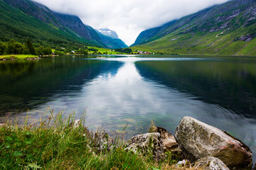 Tranquil landscape with beautiful lake and reflection in More og Romsdal County, Norway