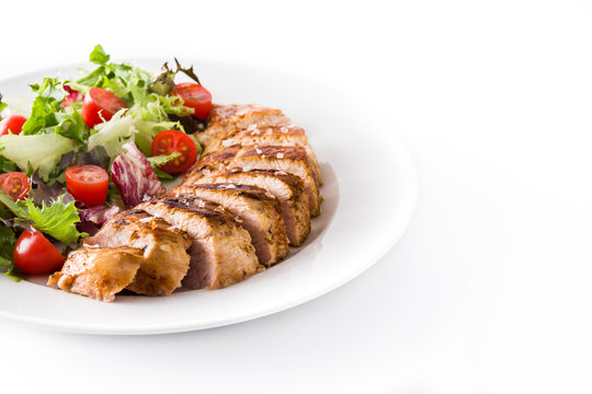 Grilled Chicken Breast With Vegetables On A Plate Isolated On White Background. Copyspace