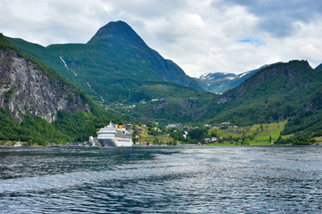 Beautiful landscape with Ferry cruise passenger at Geirangerfjord , stunning natural masterpiece included in UNESCO World Heritage 