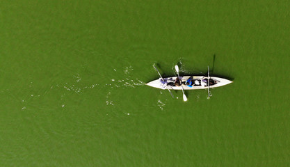 Kayaking top view. Kayak rowing. Aerial view from drone.
