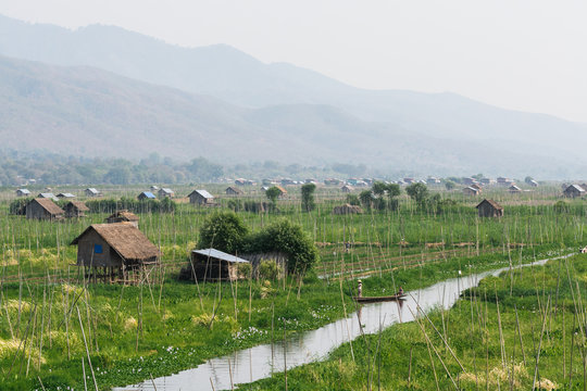 Traditional Burmese floating house on water in Inle lake, Myanmar