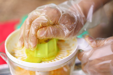 Hand making juice
