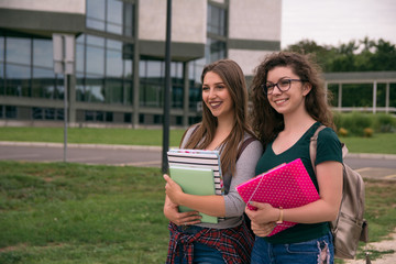 Fototapeta na wymiar Female college students on university campus
