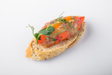 Canape mini bruskety sandwiches with fresh and steamed vegetables. Beautifully decorated catering banquet menu. Food snacks and appetizers for buffet. Isolated on white background