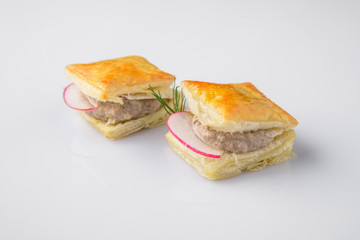 Canape with foie gras pate, turkeys, ducks, chicken. Beautifully decorated catering banquet menu. Food snacks and appetizers for buffet. Isolated on white background