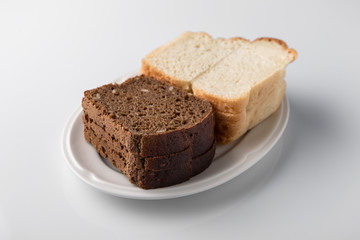 Sliced bread. Beautifully decorated catering banquet menu. Food snacks and appetizers for buffet. Isolated on white background