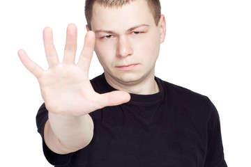 man shows the hands stop on white background