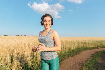 Sport, fitness, health care, cardio training. Active woman with athletic body running in the...