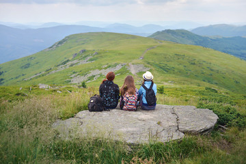 Closeup of three young female hikers