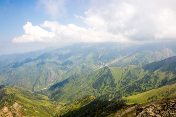 Fototapeta na wymiar Mountain valley in summer, Almaty, Kazakhstan. View from the mountain peak Kumbel