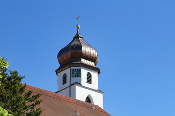 Beautiful church tower with a beautiful clock