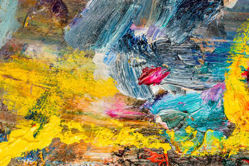 Background image of bright oil-paint palette closeup.