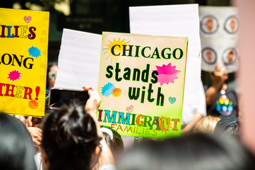Protest against Immigration ICE and Border Patrol. A sign reads 