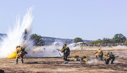 Explosions of bombs and shells. Reconstruction of the battle of world war II. Battle for...
