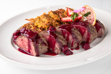 Filet mignon Beef, or Pork. Grilled young calf tenderloin with berries, mashed potatoes. Banquet festive dishes. Fine dining restaurant menu. White background. 