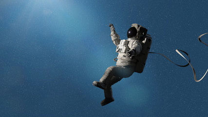 Fototapeta na wymiar astronaut performing a space walk among the stars