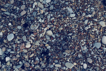 lot of small pebbles on the beach