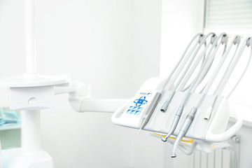 Set of professional equipment in dentist's office. Space for text