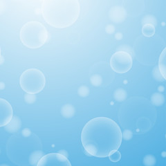 Light blue abstract background with a bokeh in the form of circles. Underwater world with air bubbles. Vector illustration.