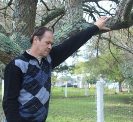 Sad man in park