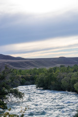 Stormy Chilik River in the steppes of Kazakhstan