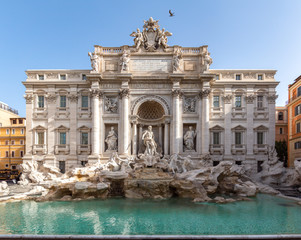 Trevi Fountain (Fontana di Trevi) in the early morning, famous fountain in the Trevi district of Rome - Italy. - obrazy, fototapety, plakaty