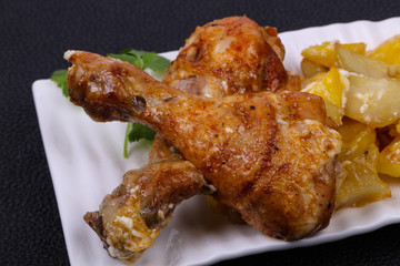 Roasted chicken legs with potato