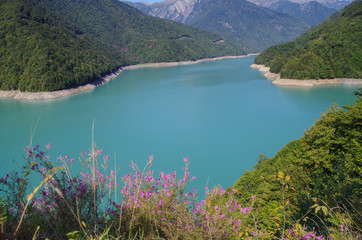 Beautiful landscape of the green-blue Enguri River. Nature and travel. Georgia