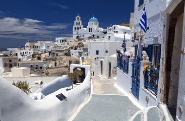 Pyrgos, Santorini, Greece. Famous attraction of white village with cobbled streets, Greek Cyclades Islands, Aegean Sea.