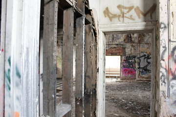 destroyed wall in abandoned building