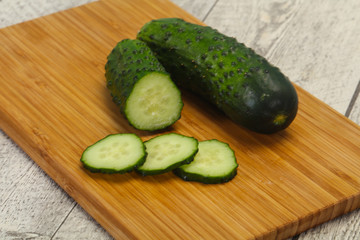 Ripe fresh green two cucumbers