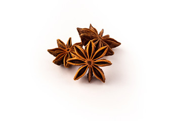 group of dried star anise on white background