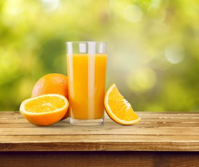 Orange juice and slices of orange on background © BillionPhotos.com