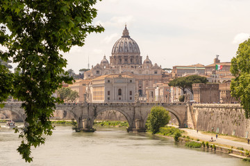 Fototapeta premium View of the Vatican, St. Peter's Basilica, St. angel bridge over the Tiber river. Rome, Italy.