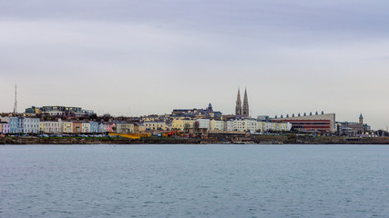 Fototapeta premium Skyline of Dun Laoghaire, Ireland as viewed from Forty Foot