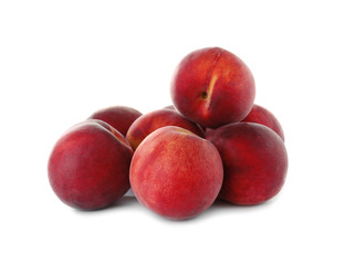 Delicious ripe sweet peaches isolated on white