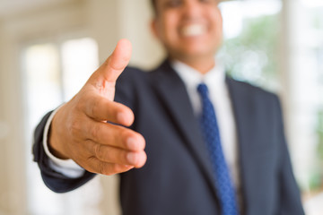 Close up of business man handing hand, meeting concept